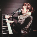 Laura aka Ludic, on piano